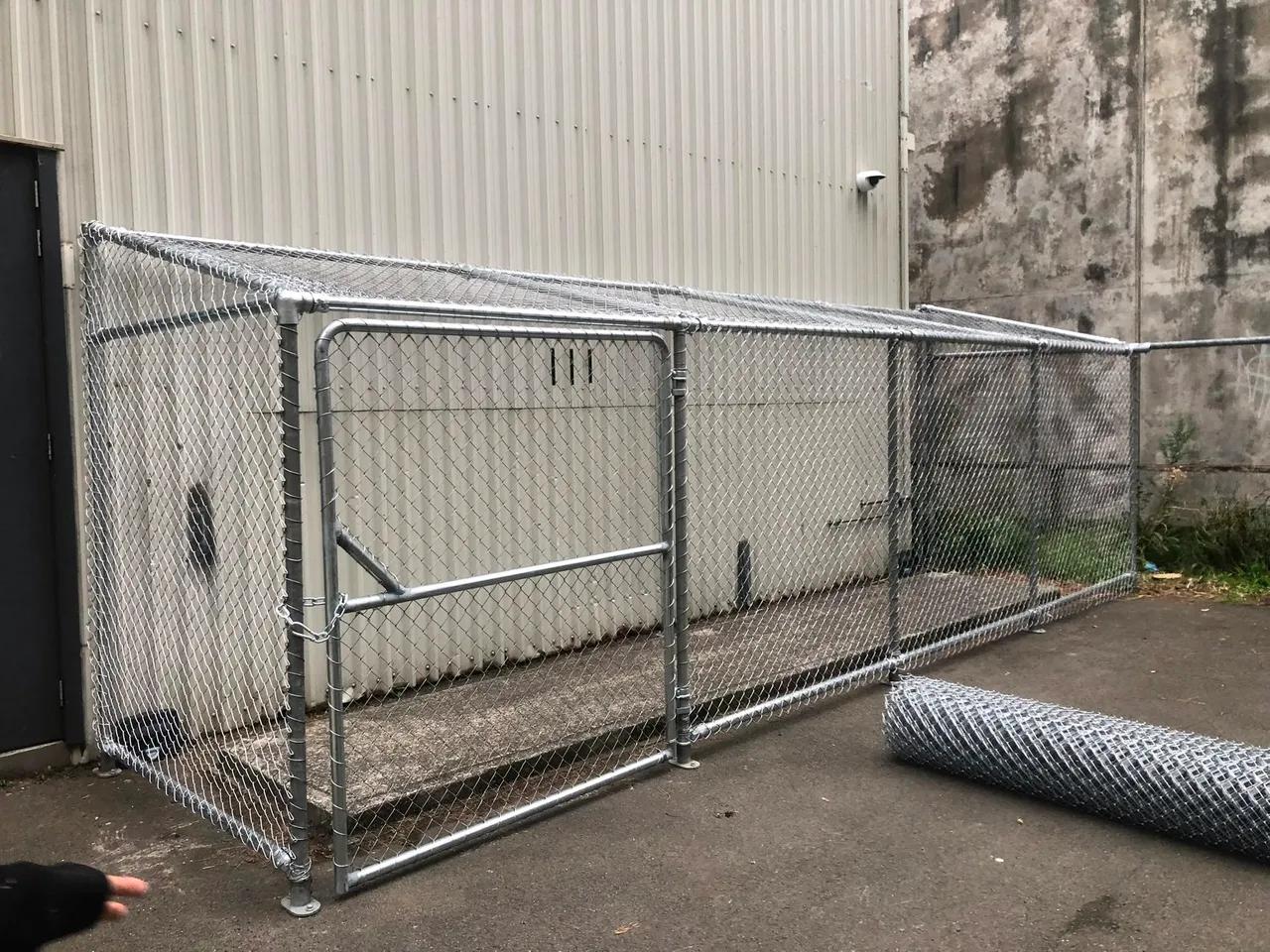 Galvanised chain-link mesh run at a Wellington site